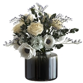 Bouquet with roses and anemones in an Ikea vase