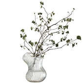 Bouquet of branches in an asymmetric vase