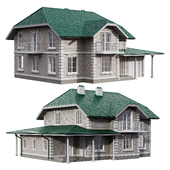 Two-story house in a classic style with facade stucco and columns