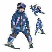 Child in overalls skiing