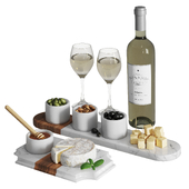Set with white wine and snacks